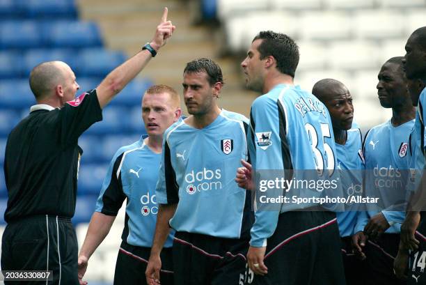 Referee Mike Dean send Fulham Players away before sending off Andy Cole of Fulham during the Premier League match between West Bromwich and Fulham at...