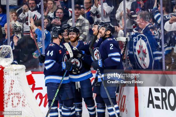 Josh Morrissey, Mark Scheifele, Kyle Connor, Gabriel Vilardi and Dylan DeMelo of the Winnipeg Jets celebrate a first period goal against the St....