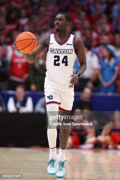 Dayton Flyers guard Kobe Elvis controls the ball during the game against the Davidson Wildcats and the Dayton Flyers on February 27 at UD Arena in...