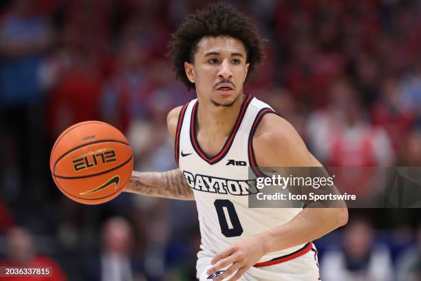 Dayton Flyers guard Javon Bennett controls the ball during the game against the Davidson Wildcats and the Dayton Flyers on February 27 at UD Arena in...