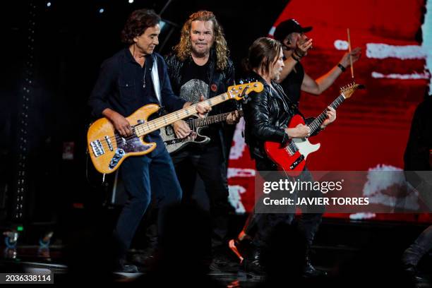 Mexican bassist Juan Calleros , Mexican singer Fernando Olvera and Mexican guitarist Sergio Vallin , members of Mexican band Mana, perform during the...