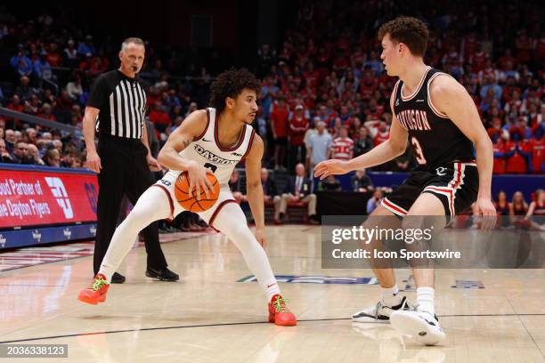 Dayton Flyers guard Javon Bennett controls the ball during the game against the Davidson Wildcats and the Dayton Flyers on February 27 at UD Arena in...