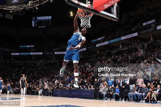 Anthony Edwards of the Minnesota Timberwolves dunks the ball during the game against the San Antonio Spurs on February 27, 2024 at Target Center in...