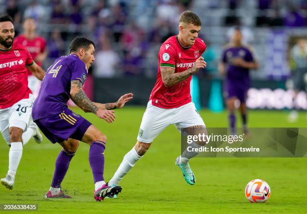 Cavalry forward Myer Bevan runs with the ball during the MLS soccer match between the Orlando City SC and Cavalry FC on February 27th, 2024 at Inter...