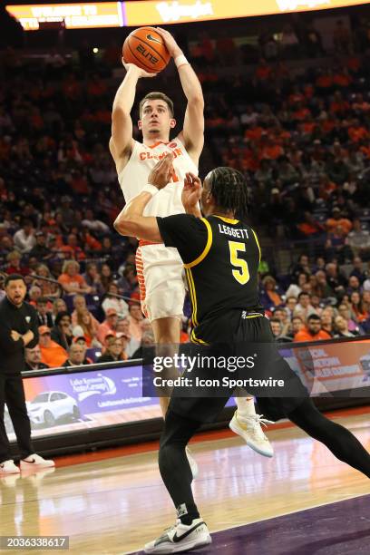 Clemson Tigers guard Joseph Girard III takes a jump shot during a college basketball game between the Pittsburgh Panthers and the Clemson Tigers on...