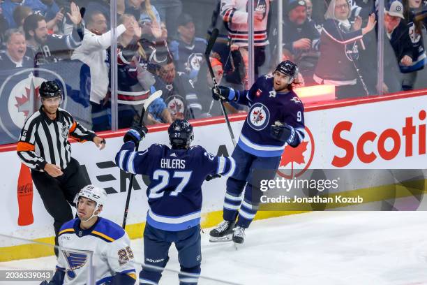 Alex Iafallo of the Winnipeg Jets celebrates his third period goal against the St. Louis Blues with teammate Nikolaj Ehlers at the Canada Life Centre...