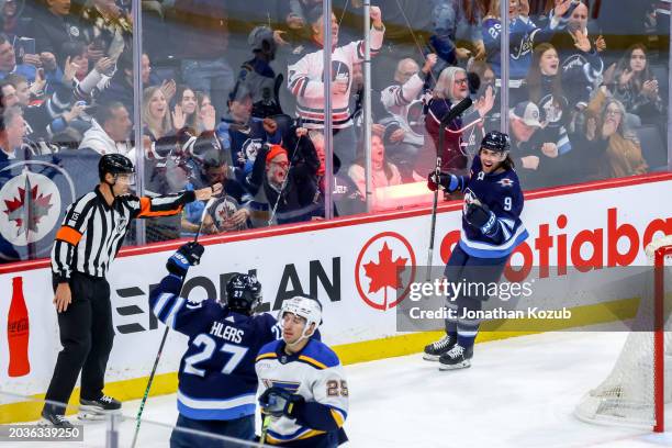 Alex Iafallo of the Winnipeg Jets celebrates his third period goal against the St. Louis Blues with teammate Nikolaj Ehlers at the Canada Life Centre...