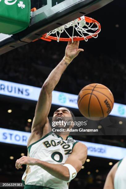 Jayson Tatum of the Boston Celtics dunks the ball during a game against the Philadelphia 76ers at TD Garden on February 27, 2024 in Boston,...