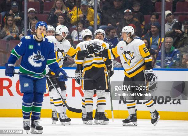 Rickard Rakell of the Pittsburgh Penguins celebrates his goal with teammates during the second period of their NHL game against the Vancouver Canucks...