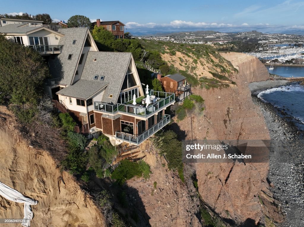An aerial view of cliff-top houses along Scenic Drive and sit close to a landslide in Dana Point