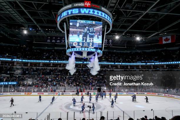 Winnipeg Jets salute the fans as they leave the ice following a 4-2 victory over the St. Louis Blues at the Canada Life Centre on February 27, 2024...