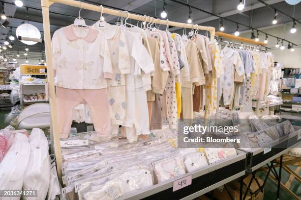 Baby clothes displayed for sale at a baby supplies store in Siheung, South Korea, on Tuesday, Feb. 27, 2024. The lack of babies is speeding up the...