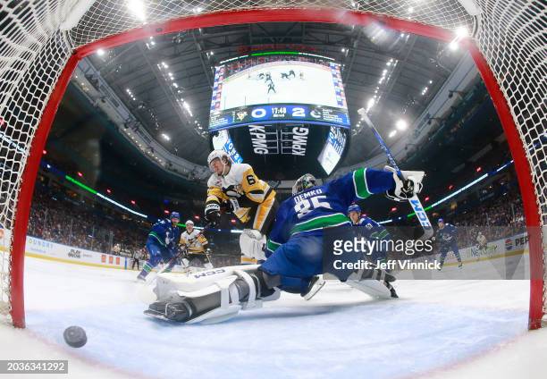 Rickard Rakell of the Pittsburgh Penguins scores a goal on Thatcher Demko of the Vancouver Canucks during the second period of their NHL game at...