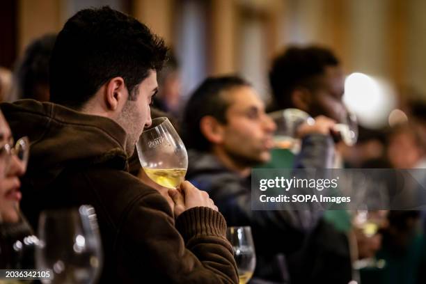 Man seen tasting wine at the wine stands during the Essence of Wine event. Essência do Vinho commemorates its 20th-year milestone at the iconic...