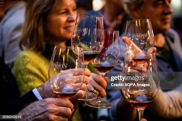 People make a toast during the Essence of Wine event. Essência do Vinho commemorates its 20th-year milestone at the iconic Palácio da Bolsa from Feb...