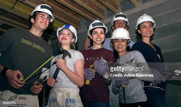 Cast members from the TV drama, All My Children, volunteer to build a Habitat for Humanity house May 28, 2003 in Bronx neighborhood of New York City....
