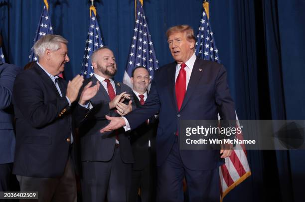 Republican presidential candidate and former President Donald Trump walks on stage to speak during an election night watch party at the State...