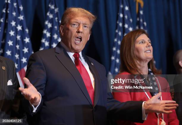 Republican presidential candidate and former President Donald Trump speaks during an election night watch party at the State Fairgrounds on February...