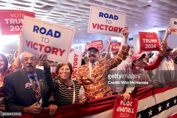 Supporters of Republican presidential candidate and former President Donald Trump cheer during an election night watch party at the State Fairgrounds...