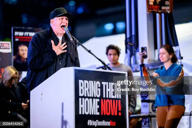 Michael Rapaport speaks to the crowd people gathered outside the HaKirya base which serves as the IDF's headquarters to demand the return of the...