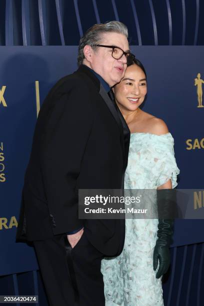 Oliver Platt and Greta Lee attend the 30th Annual Screen Actors Guild Awards at Shrine Auditorium and Expo Hall on February 24, 2024 in Los Angeles,...