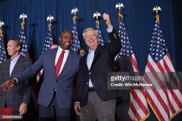 Sen. Tim Scott and Sen. Lindsey Graham cheer on Republican presidential candidate and former President Donald Trump speaks during an election night...