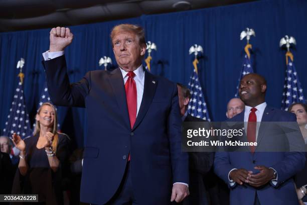 Republican presidential candidate and former President Donald Trump greets supporters during an election night watch party at the State Fairgrounds...