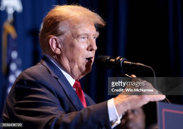 Republican presidential candidate and former President Donald Trump speaks during an election night watch party at the State Fairgrounds on February...