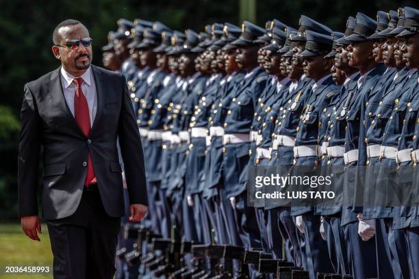 Prime Minister of Ethiopia Abiy Ahmed inspects a guard of honour by members of the Kenya Defence Forces during his official state visit to State...