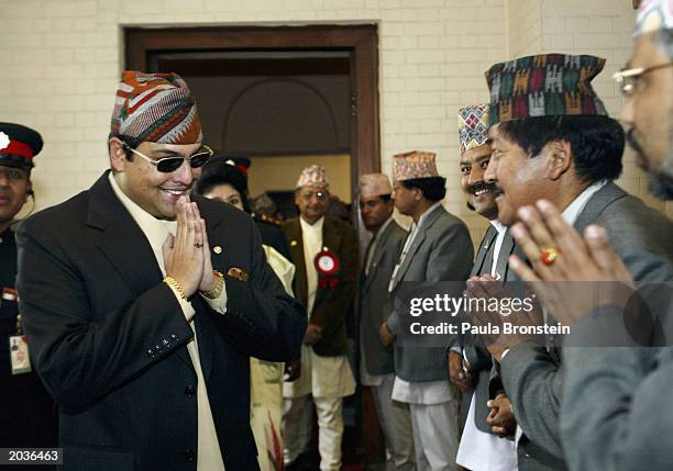 Nepalese Crown Prince Paras Bir Bikram Shah Dev greets officials during ceremonies celebrating the 50th anniversary of the conquering of Mount...