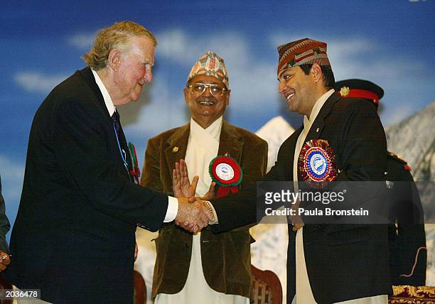 Sir Edmund Hillary greets Nepalese Crown Prince Paras Bir Bikram Shah Dev during ceremonies celebrating the 50th anniversary of the conquering of...