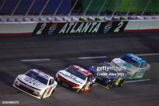 Yeley, driver of the SS GreenLight Racing Chevrolet, Leland Honeyman, driver of the LH Waterfront Construction Chevrolet, Ryan Ellis, driver of the...