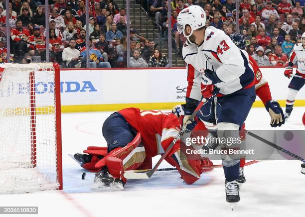 Tom Wilson of the Washington Capitals scores at 10:11 of the third period against Anthony Stolarz of the Florida Panthers at Amerant Bank Arena on...