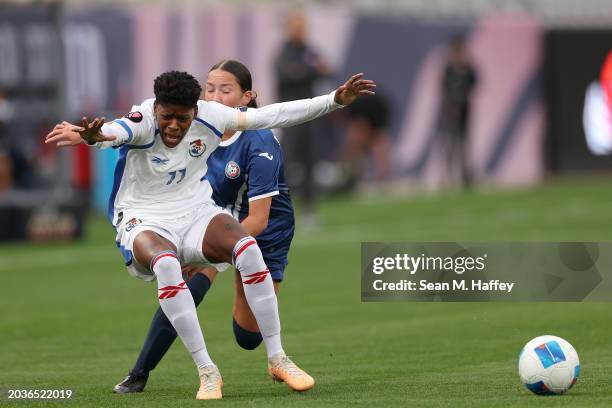 Isabel Martinez of Puerto Rico fouls Natalia Mills of Panama during the first half of a Group B - 2024 Concacaf W Gold Cup game at Snapdragon Stadium...