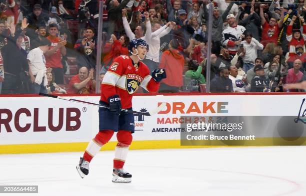 Gustav Forsling of the Florida Panthers scores the game-winning goal in overtime against Charlie Lindgren of the Washington Capitals at Amerant Bank...