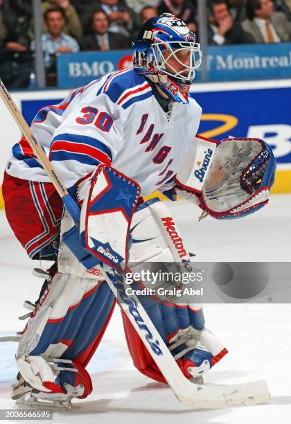 Mike Dunham of the New York Rangers skates against the Toronto Maple Leafs during NHL game action on December 2, 2003 at Air Canada Centre in...