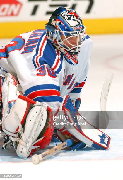 Mike Dunham of the New York Rangers skates against the Toronto Maple Leafs during NHL game action on December 2, 2003 at Air Canada Centre in...