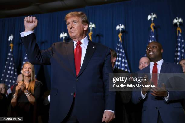 Republican presidential candidate and former President Donald Trump gestures to supporters during an election night watch party at the State...