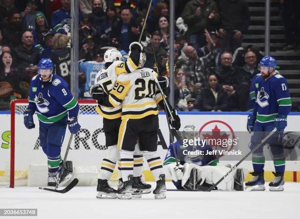 Erik Karlsson of the Pittsburgh Penguins celebrates after scoring in overtime against Thatcher Demko of the Vancouver Canucks during their NHL game...
