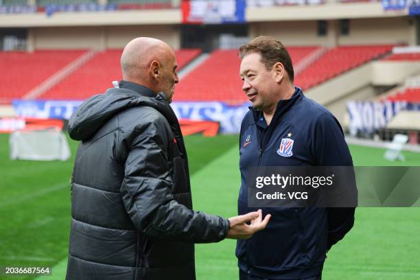Head coach Kevin Vincent Muscat of Shanghai Port chats with head coach Leonid Slutsky of Shanghai Shenhua ahead of the 2024 Chinese Football...