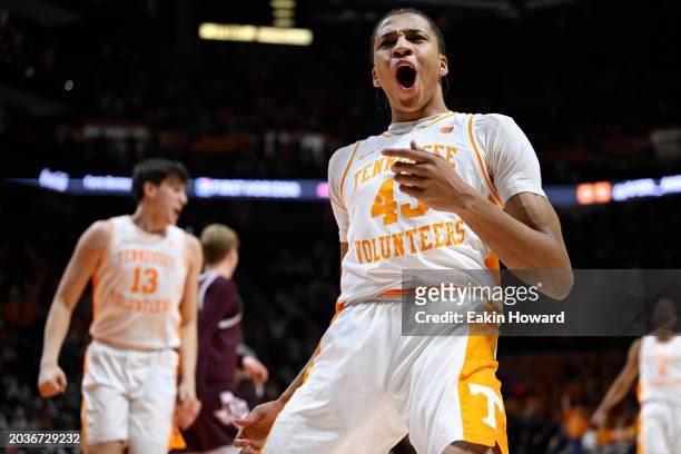 Cameron Carr of the Tennessee Volunteers celebrates his dunk against the Texas A&M Aggies in the second half at Thompson-Boling Arena on February 24,...