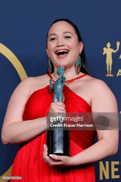 Lily Gladstone, winner of the Outstanding Performance by a Female Actor in a Leading Role award for 'Killers of the Flower Moon' poses in the press...