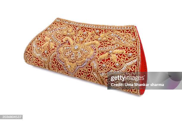 designer hand embroidered clutch bag - gold sequin dress stock pictures, royalty-free photos & images