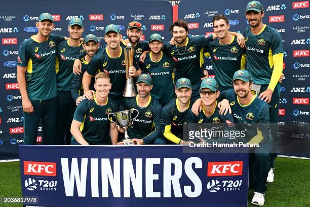 The Australia team celebrate with the trophies after their 3-0 series win after game three of the Men's T20 International series between New Zealand...