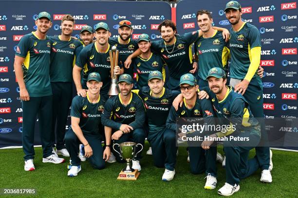 The Australia team celebrate with the trophies after their 3-0 series win after game three of the Men's T20 International series between New Zealand...