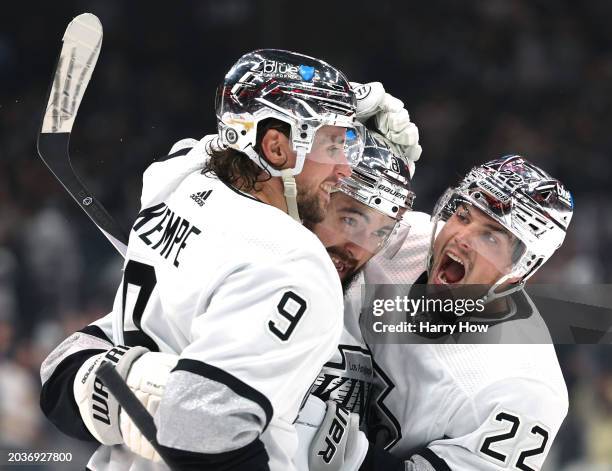 Drew Doughty of the Los Angeles Kings celebrates his goal with Kevin Fiala, and Adrian Kempe, to take a 2-1 lead over the Anaheim Ducks, during the...