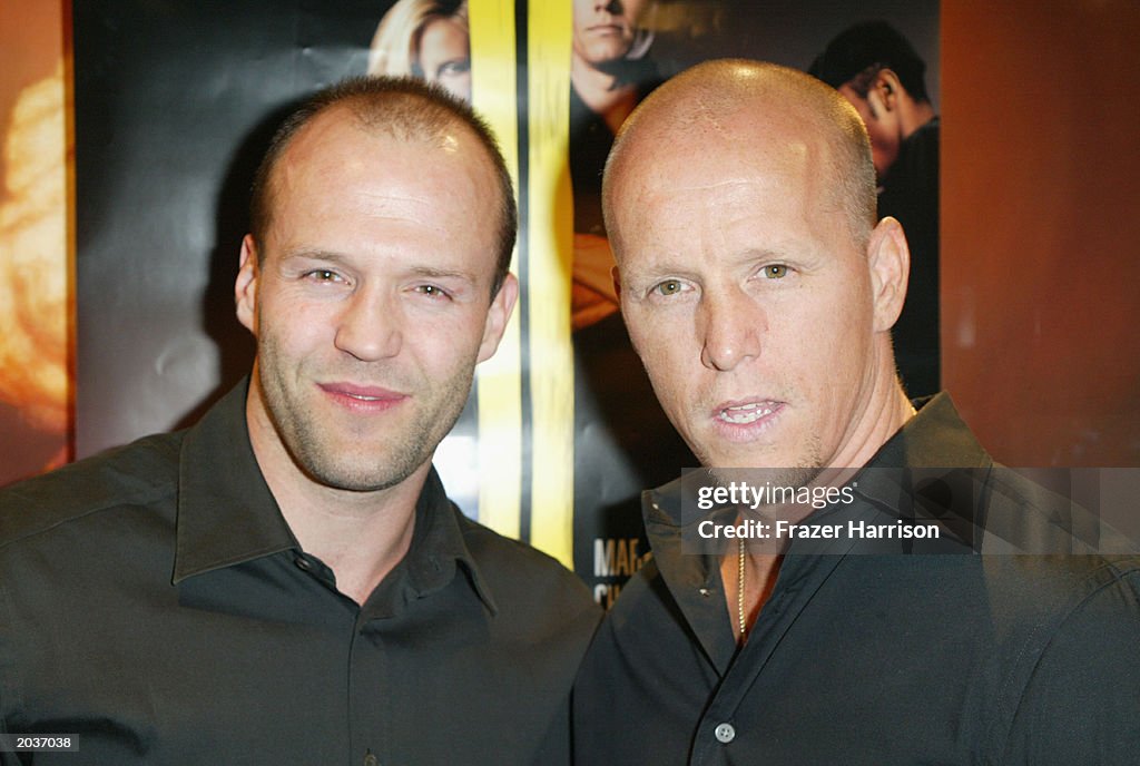 Actor Jason Statham Poses With Jim Wahlberg Brother Of Actor Mark actor-jason-statham-poses-with-jim-wahlberg-brother-of-actor-mark