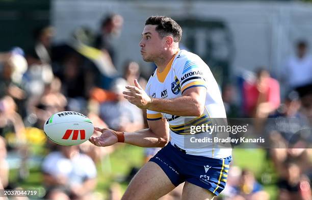 Mitchell Moses of the Eels passes the ball during the NRL Pre-season challenge match between Gold Coast Titans and Parramatta Eels at North Ipswich...