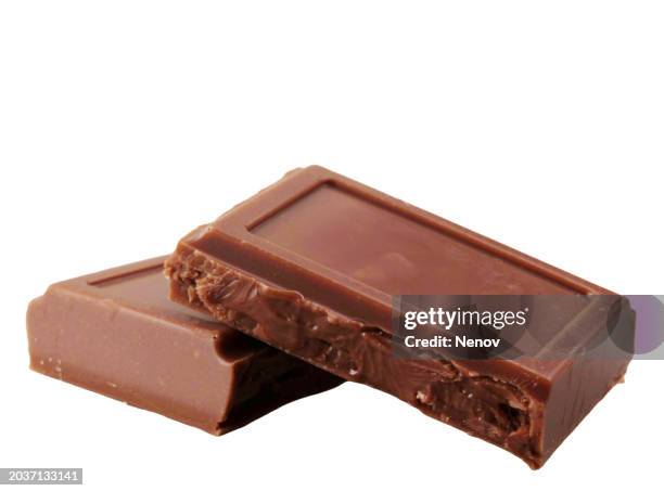 pieces of fine milk chocolate on a white background - chocolate bar stock pictures, royalty-free photos & images