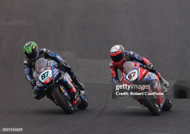 Remy Gardner of Australia and the GYTR GRT Yamaha Team and Xavi Vierge of Spain and Team HRC compete for position during race two of the World...